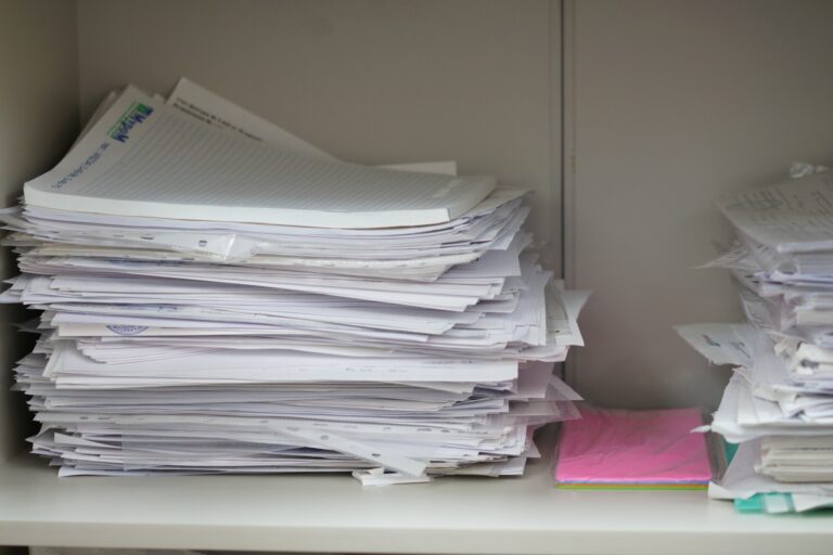 Documents and papers in a pile, documents in an office Documents and papers in a pile, documents in an office